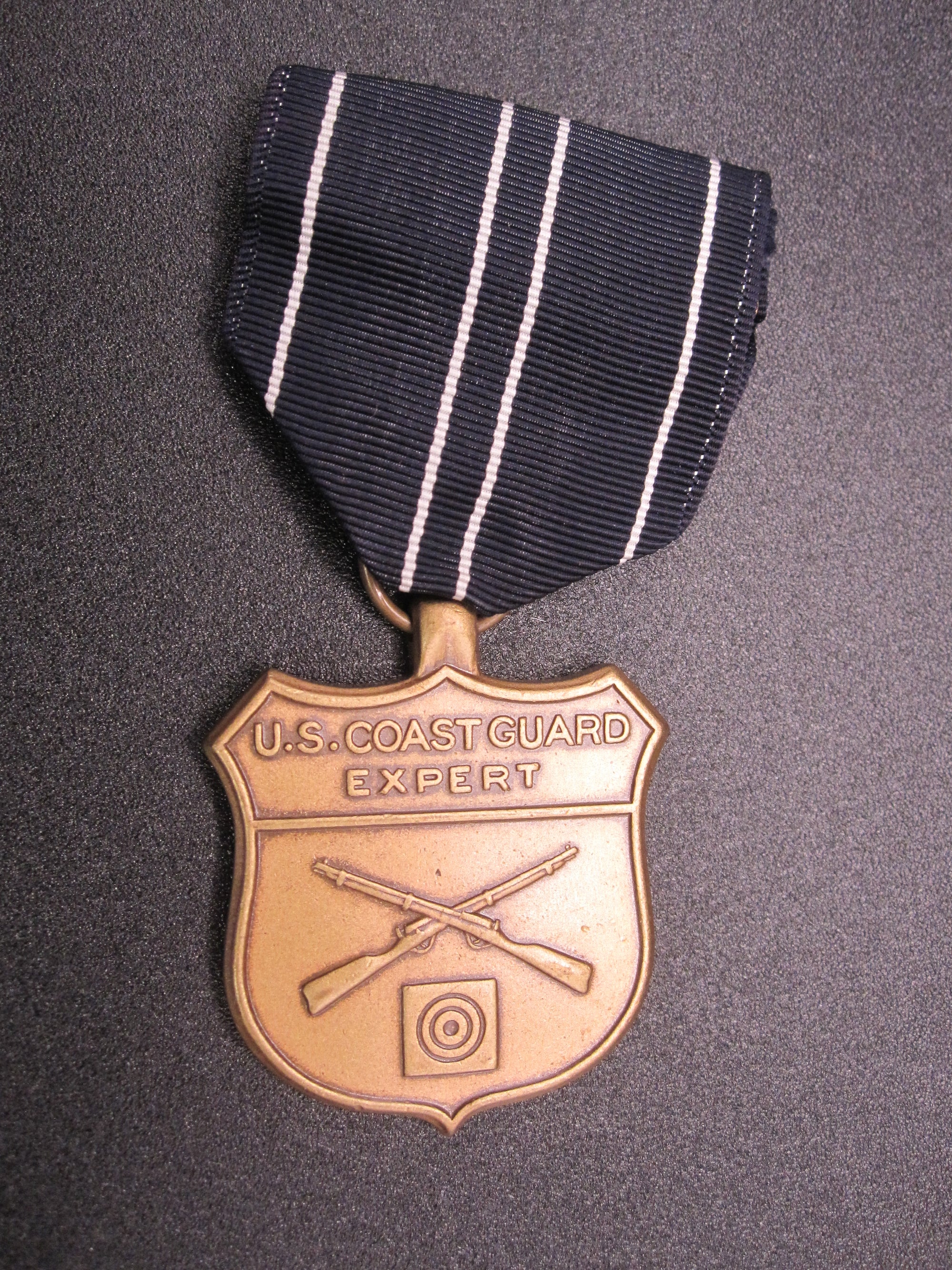 H.W.  - -   Expert Riflemen Medal