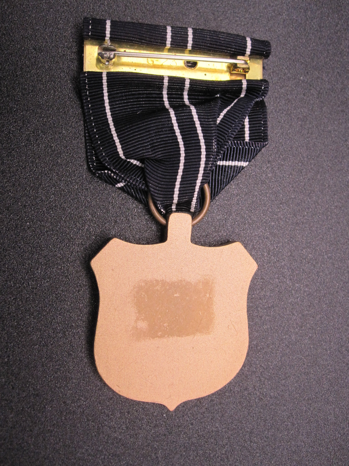 H.W.  - -   Expert Riflemen Medal