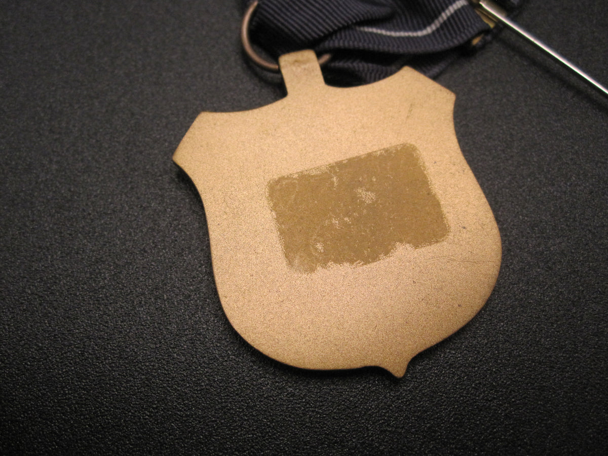 H.W.  - -   Expert Pistol Medal