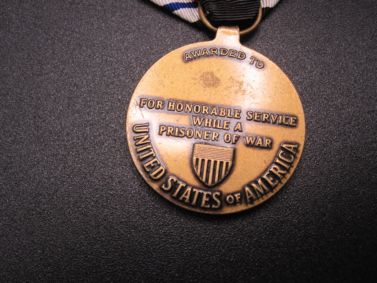 H.W.  - -    Prisoner of War Medal