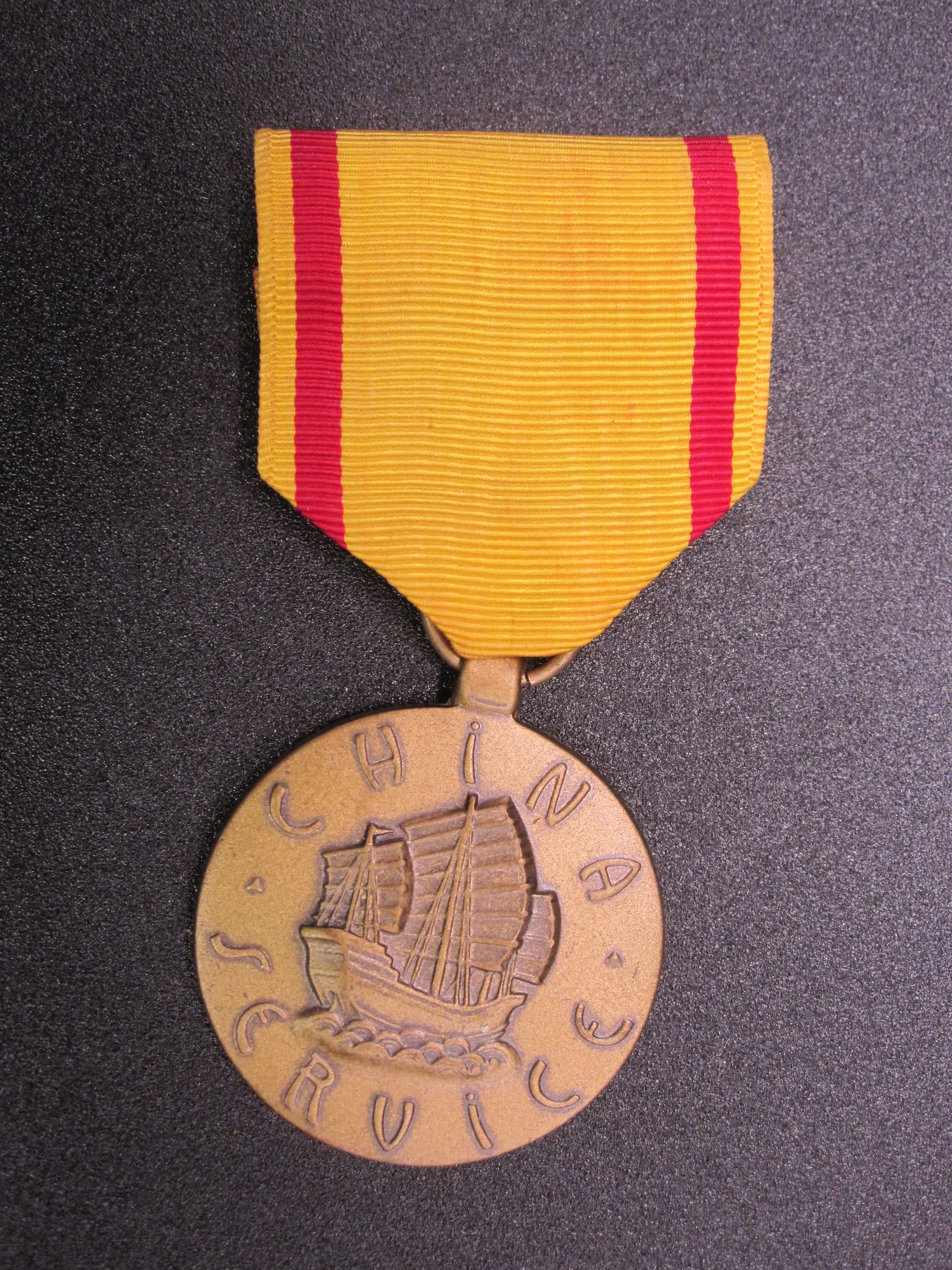 H.W.  - -    CHINA Service Medal