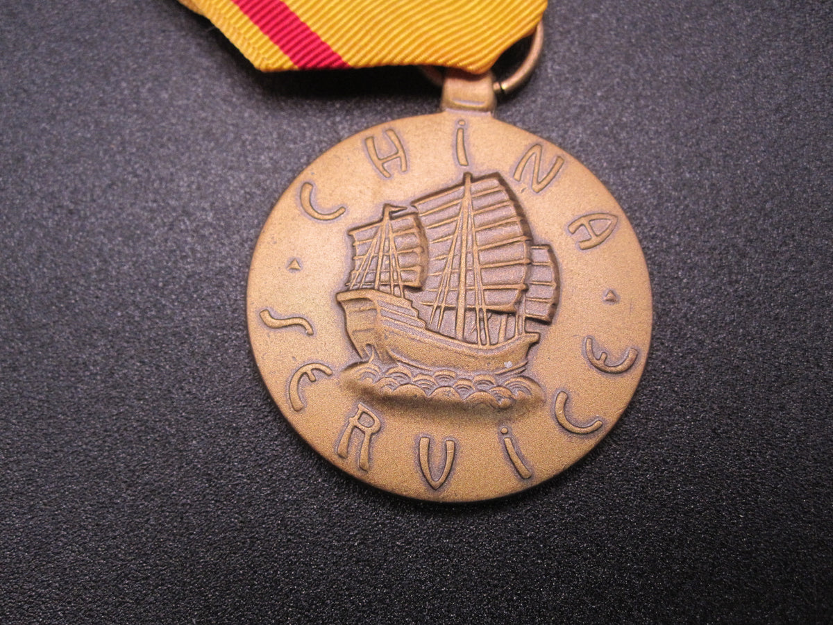 H.W.  - -    CHINA Service Medal