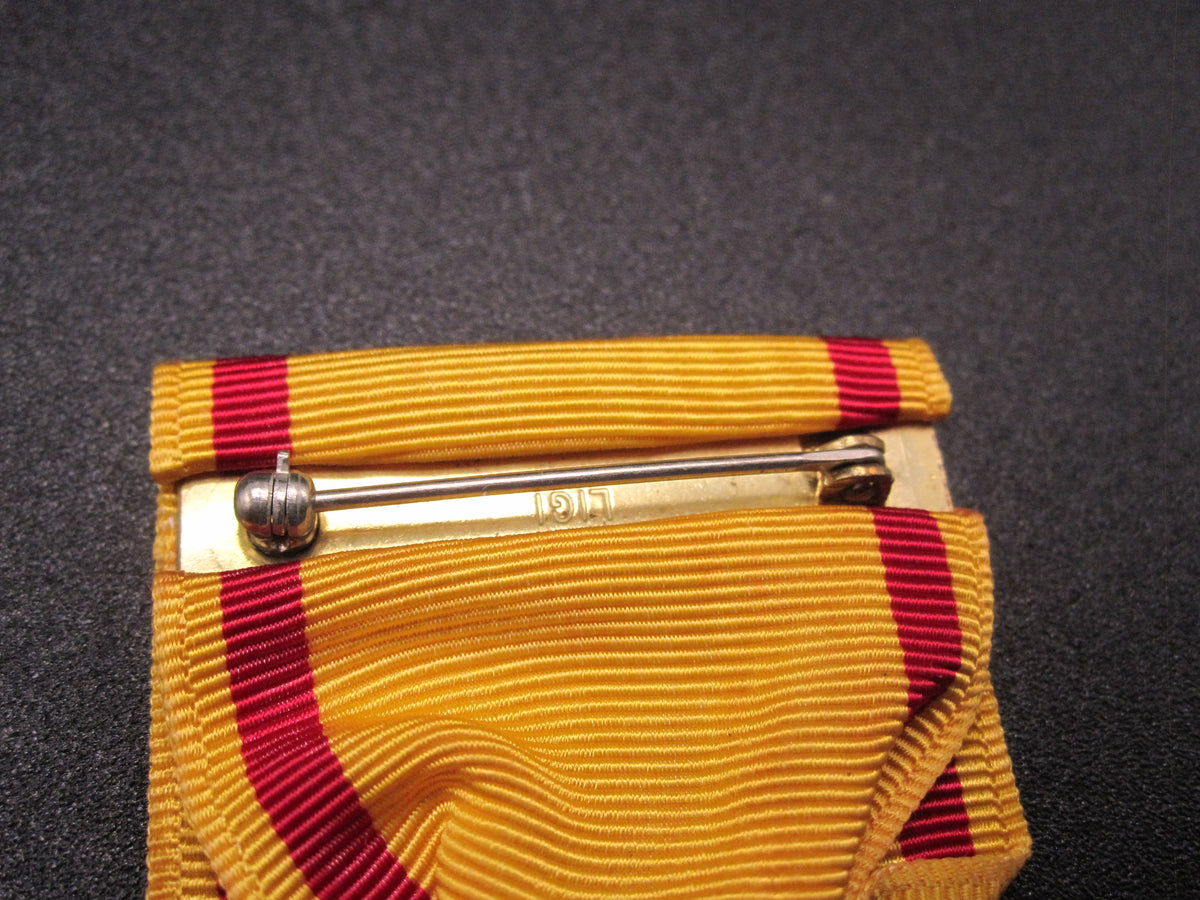 H.W.  - -    CHINA Service Medal