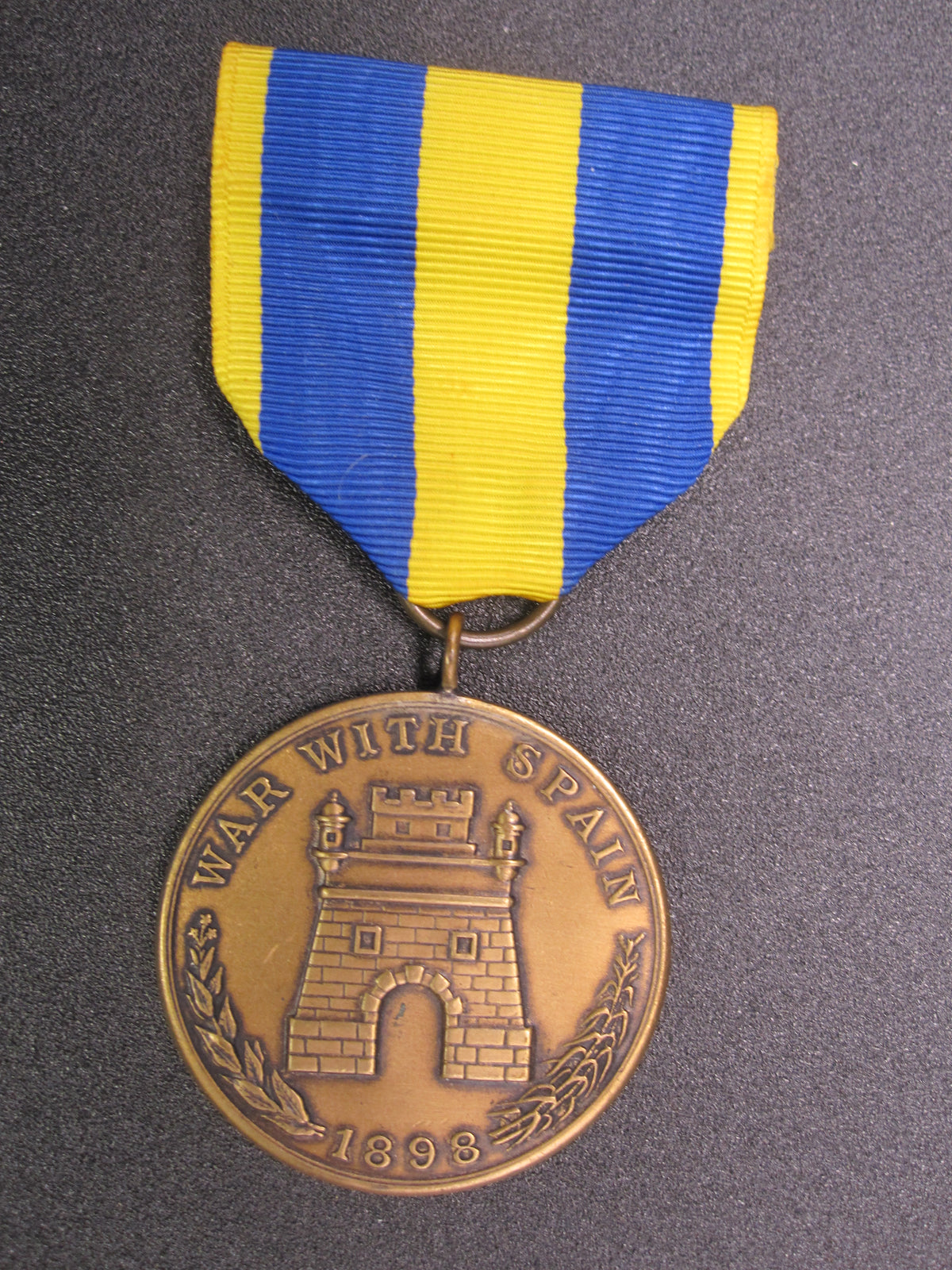 H.W.  - -    Spanish Campaign Medal 1898