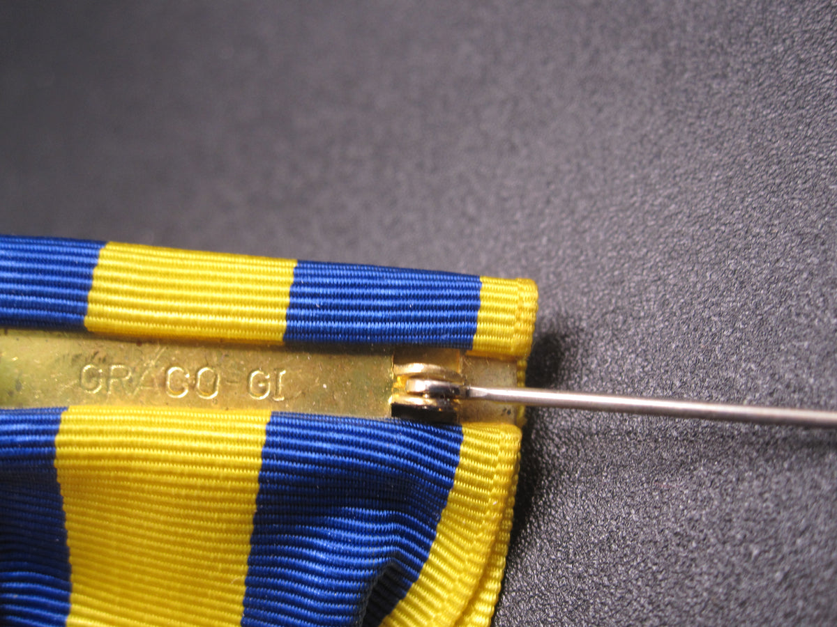 H.W.  - -    Spanish Campaign Medal 1898