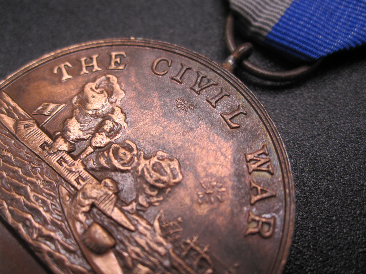H.W.  - -    Civil War Medal 1861 - 1865