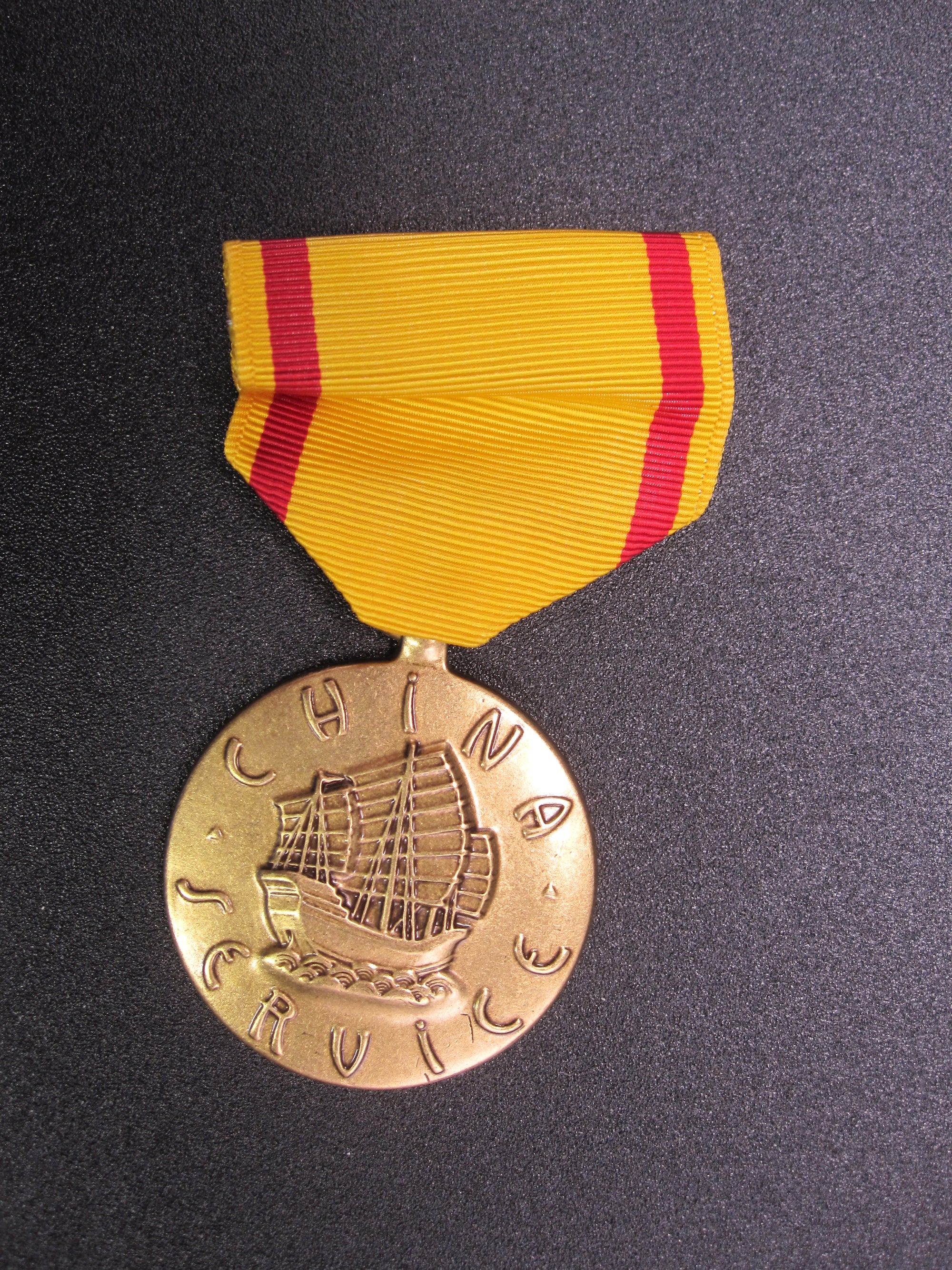 H.W.  - -    CHINA Service Medal