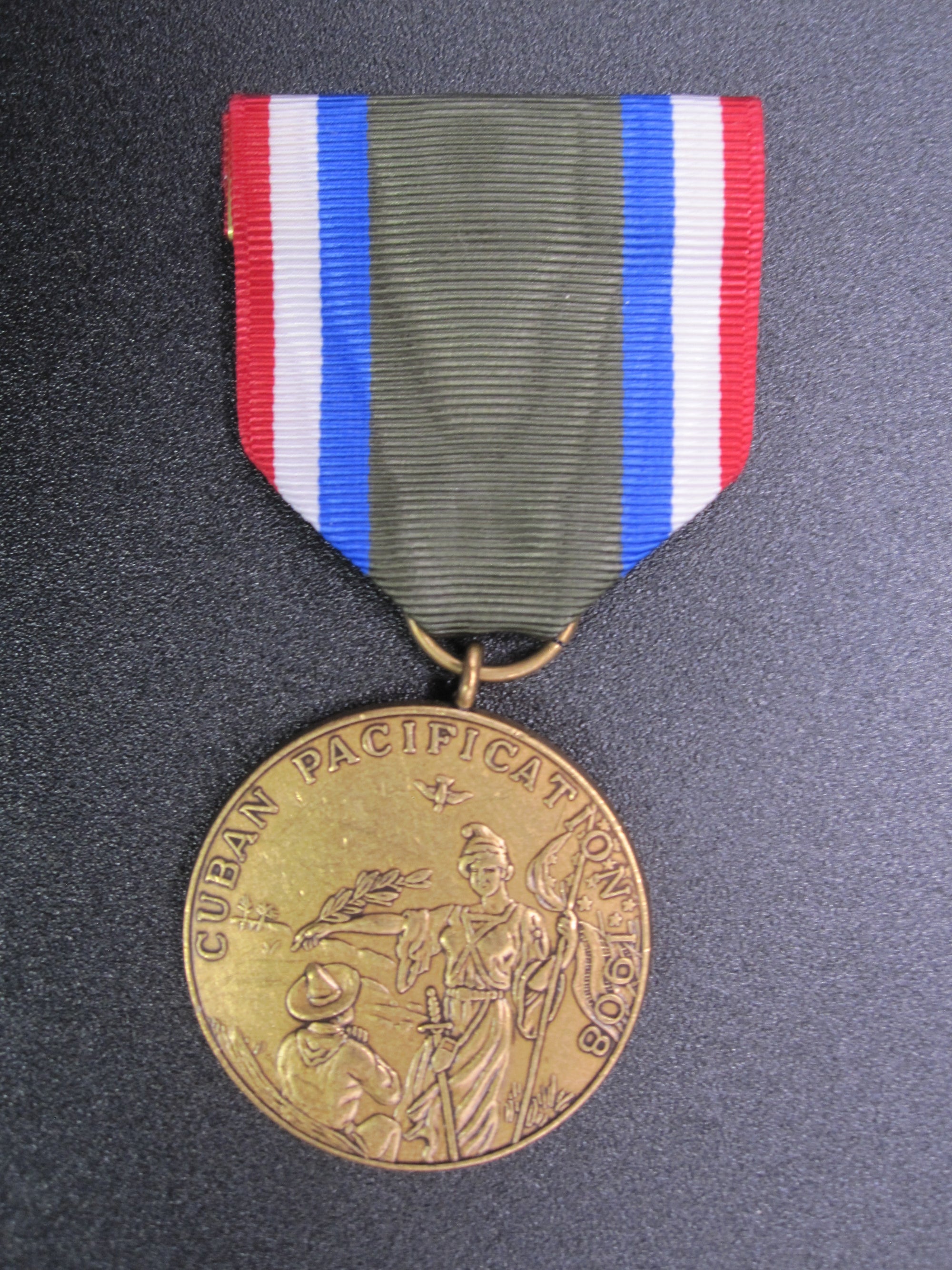 H.W.  - -    Cuban Pacification Medal 1908