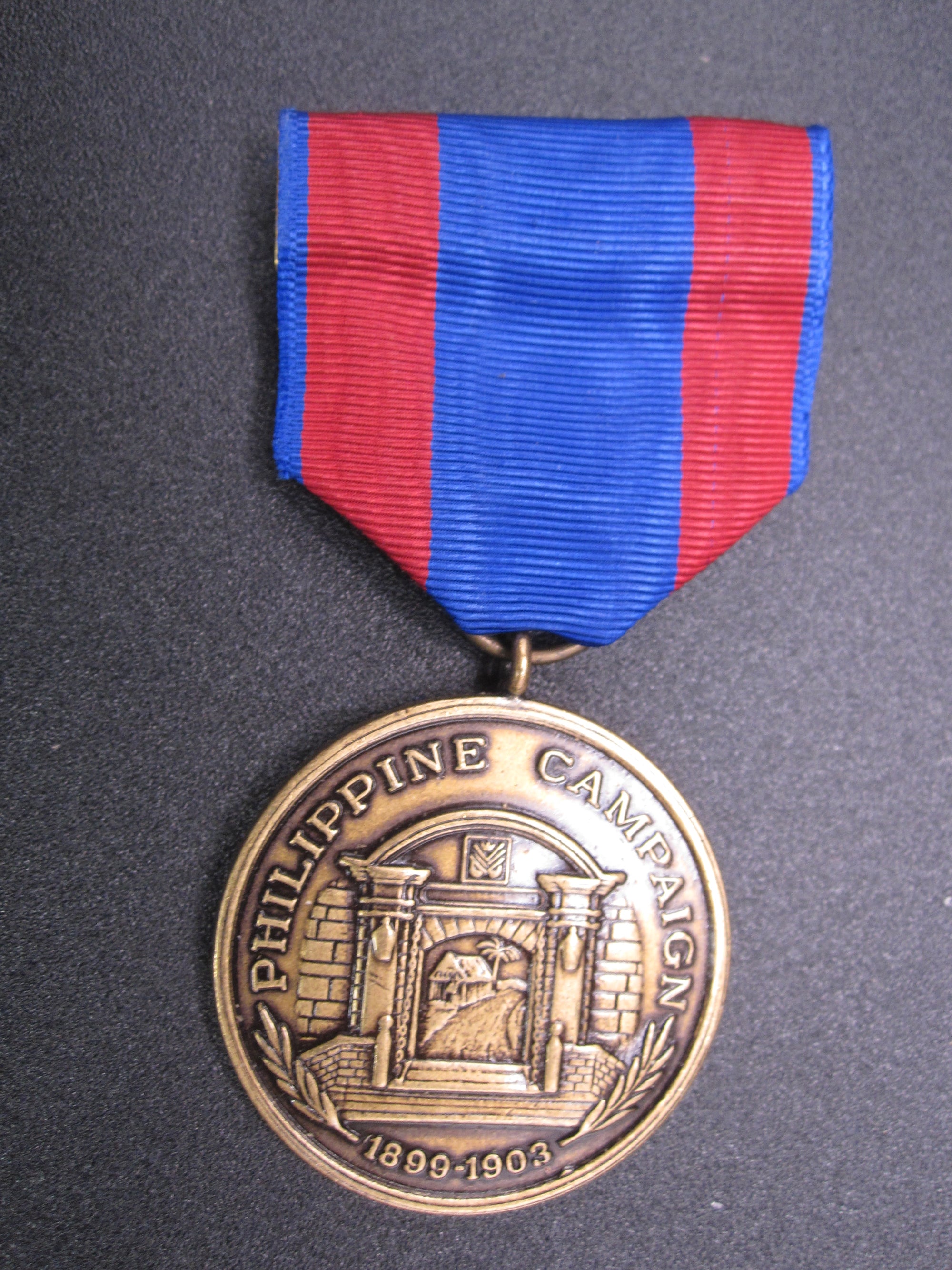 H.W.  - -    Philippine Campaign Medal 1899-1903   -NAVY-