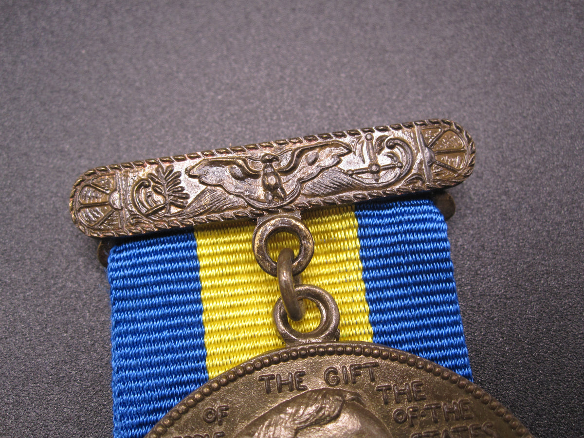 H.W.  - -    Dewey Battle of Manila Bay Medal / USS OLYMPIA