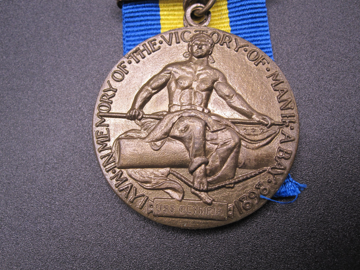 H.W.  - -    Dewey Battle of Manila Bay Medal / USS OLYMPIA