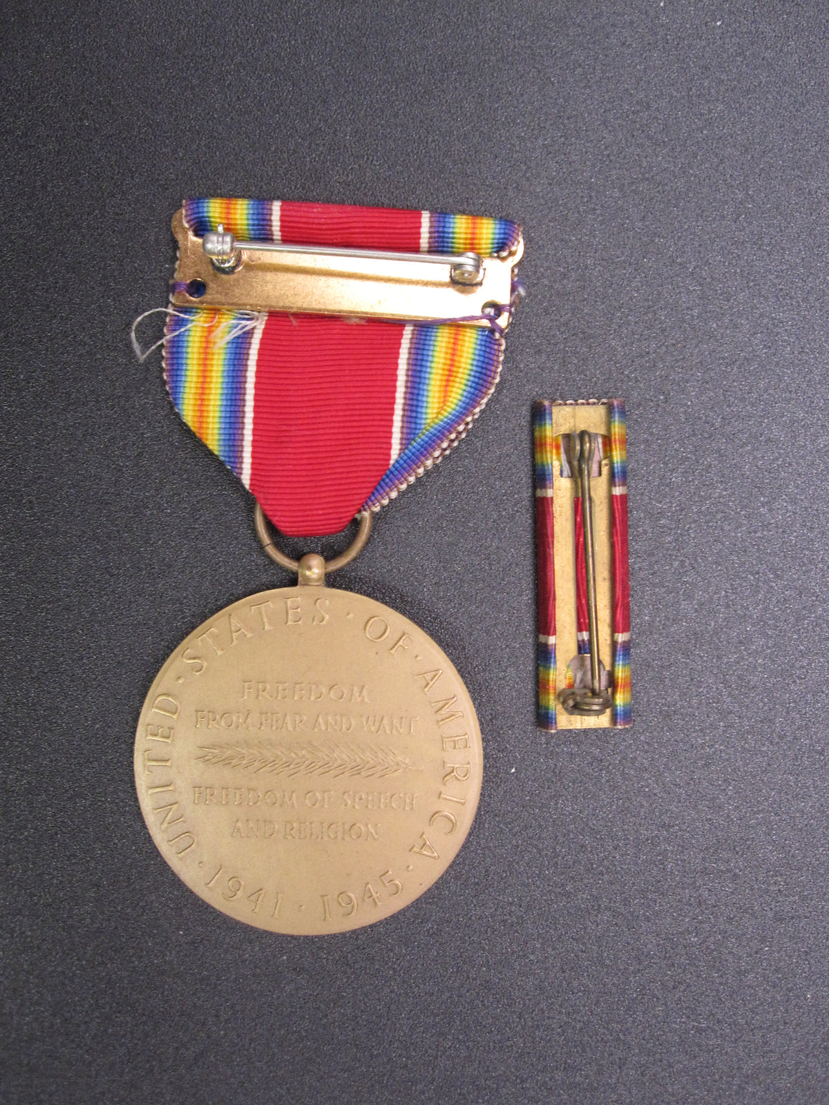 H.W.  - -    World War 2 Victory Medal 1941 - 1945