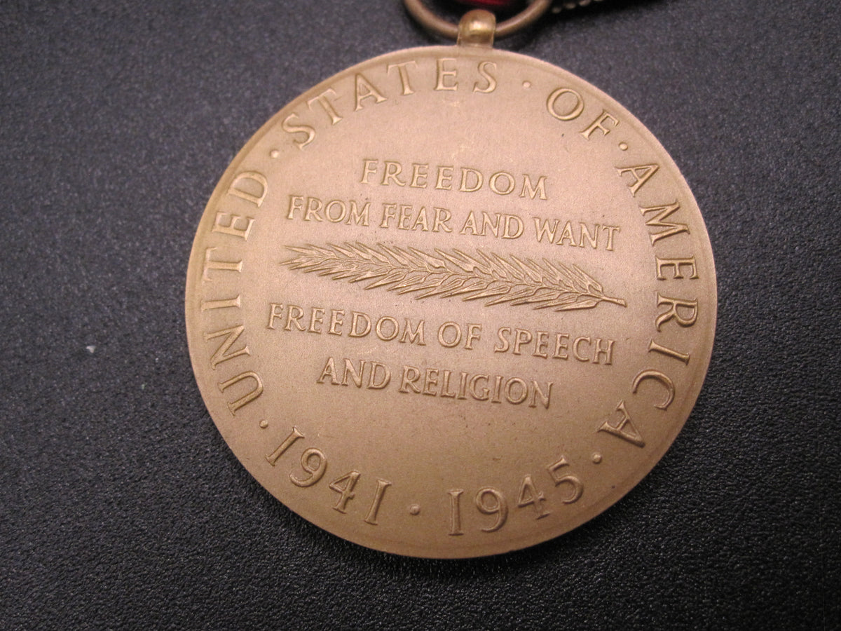 H.W.  - -    World War 2 Victory Medal 1941 - 1945