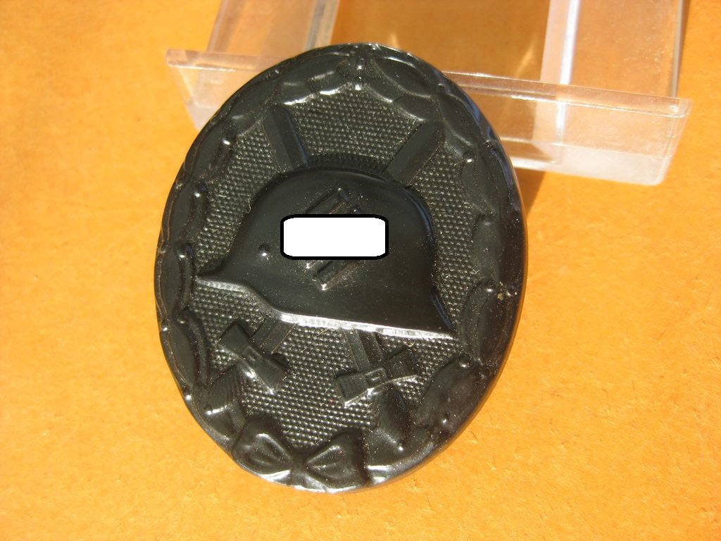 Verwundetenabzeichen in Schwarz in der Verkaufsschachtel/Verpackung /Etui