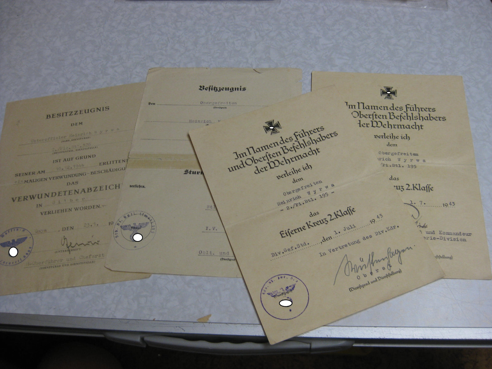 Besitzzeugnis Verleihungsurkunde Waffen-SS Eisernes Kreuz Ardennenfront Verwundetenabzeichen Silber Wehrmacht