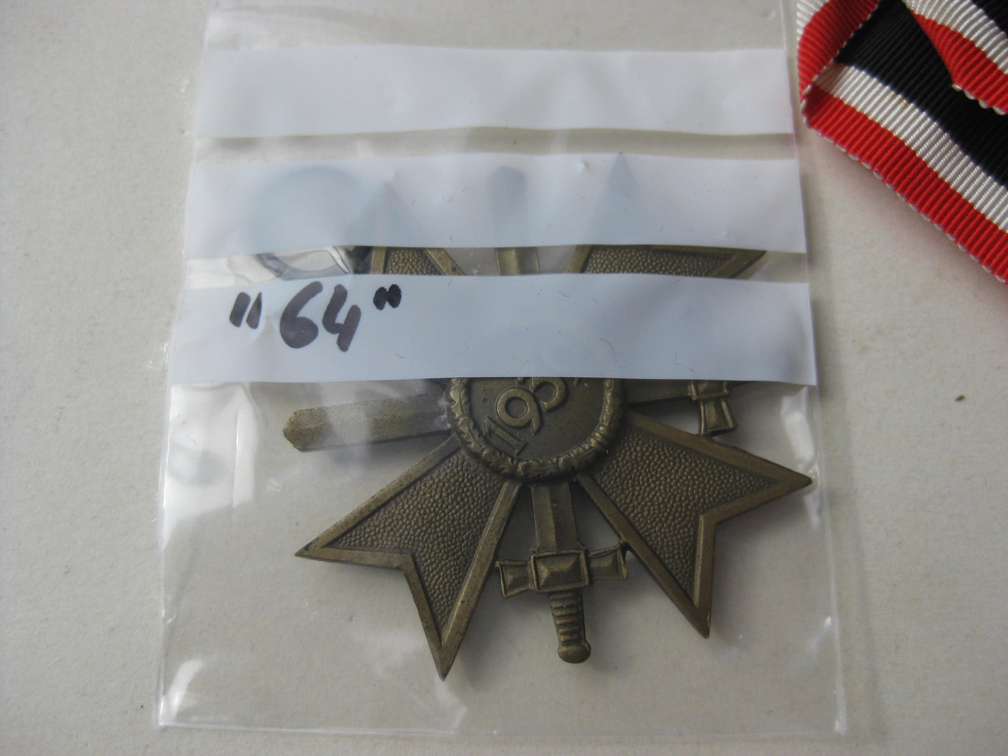 Kriegsverdienstkreuz 2.Klasse mit Schwertern KVK2/39 mit extrem seltenem Herstellerstempel: "64"
