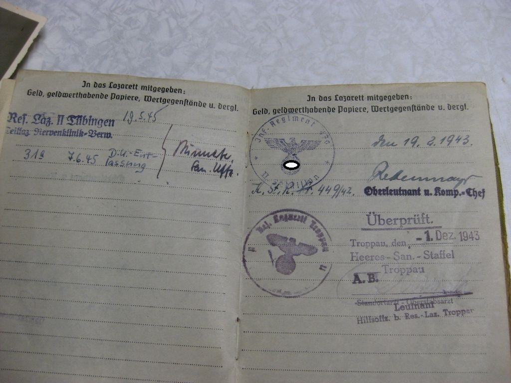 Besitzzeugnis Verleihungsurkunde Eisernes Kreuz Verwundetenabzeichen in Gold Infanterie Sturmabzeichen Ostmedaille etc etc  Wehrmacht