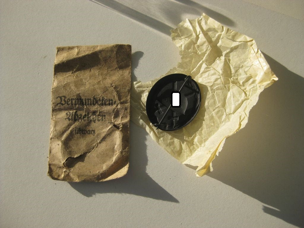 Verwundetenabzeichen in Schwarz Hersteller: "65"