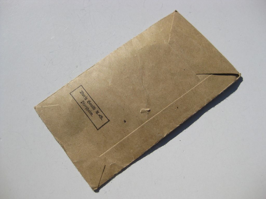 Verleihungstüte zum Verwundetenabzeichen in Schwarz Hersteller: Moritz Hausch A.G. in Pforzheim