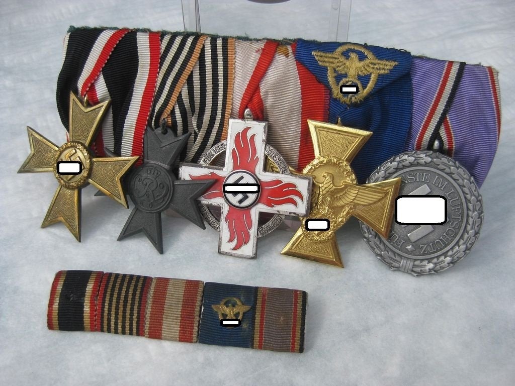 5er Ordensspange Kriegsverdienstkreuz 1939 Kriegshilfskreuz 1918 Feuerwehr Ehrenzeichen 2.Stufe Polizei Dienstauszeichnung für 25 Jahre Luftschutzmedaille 1938 Orden 3.Reich Feuerwehrorden Reichsfeuerwehrehrenzeichen Polizeiorden