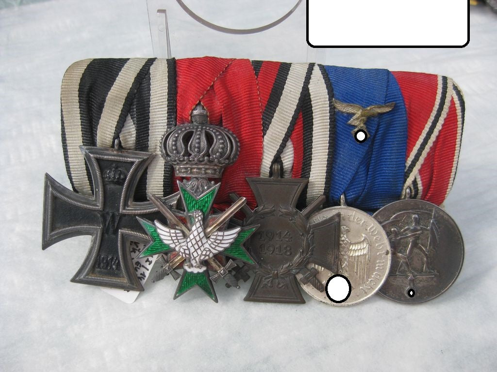 5er Ordensspange Eisernes Kreuz (EK2/14) Hausorden der Wachsamkeit Sachsen Weimar Ritterkreuz vom weissen Falken mit Schwertern Ehrenkreuz für Frontkämpfer Dienstauszeichnung der Wehrmacht / Luftwaffe Medaille 13. März 1938 Österreich Verdienstkreuz Orden